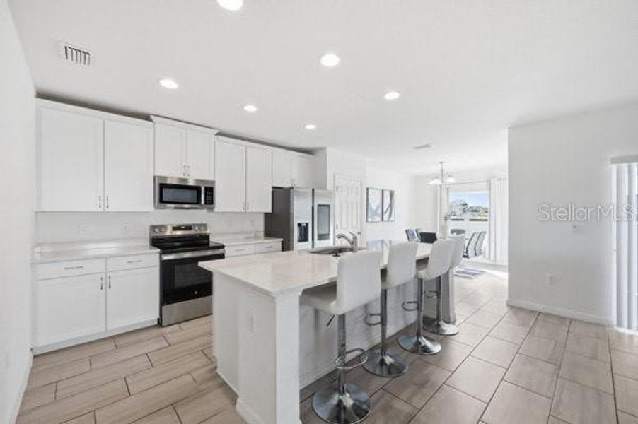 Furnished interior view inside a new home in , Davenport (Image 12).