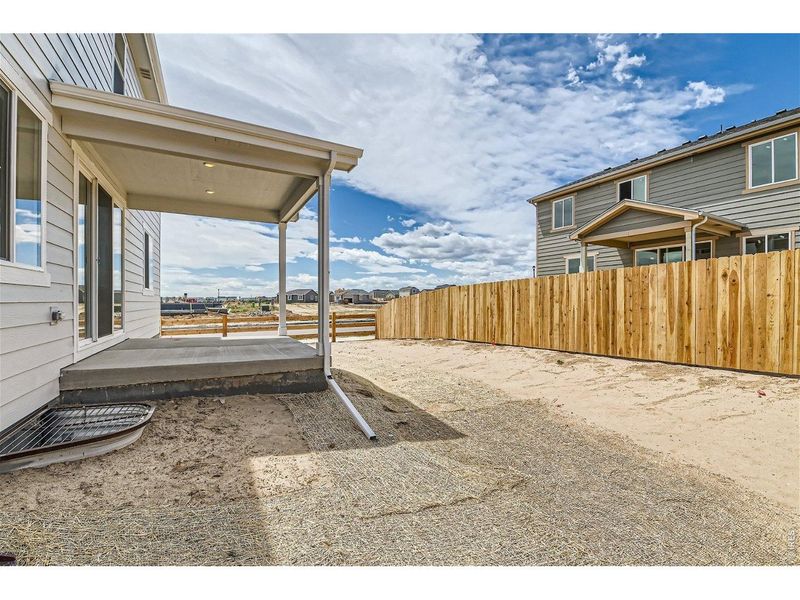 Exterior details and patio area of a home in Hidden Creek, Frederick (Image 23).