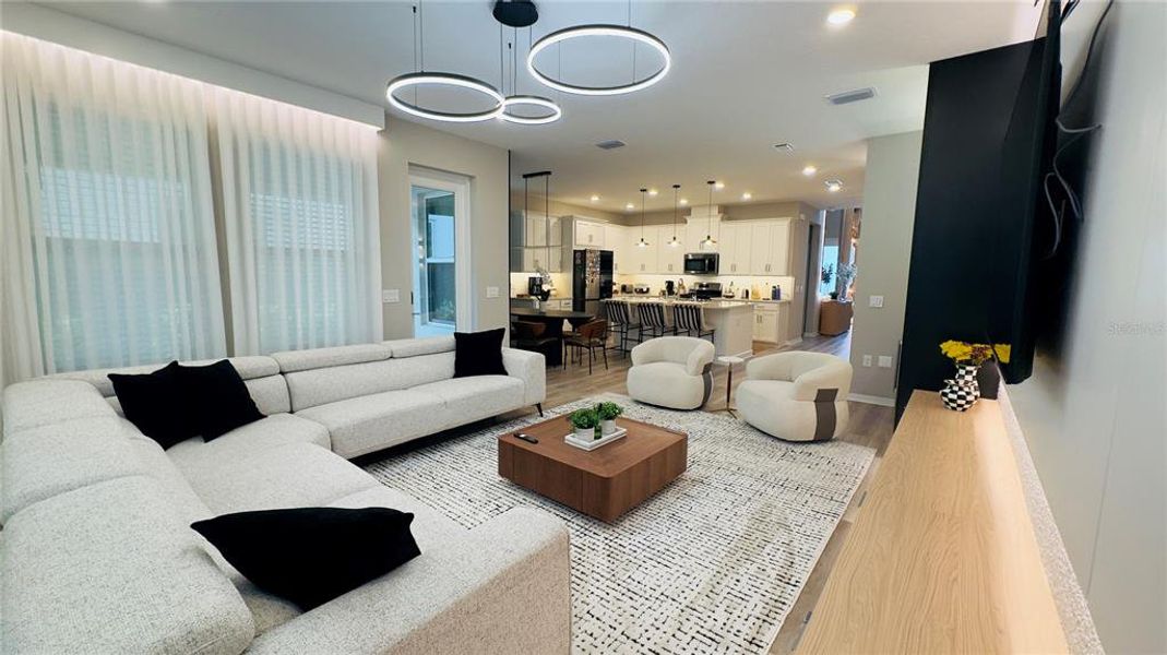 Furnished interior view inside a new home in Harvest at Ovation, Winter Garden (Image 10).