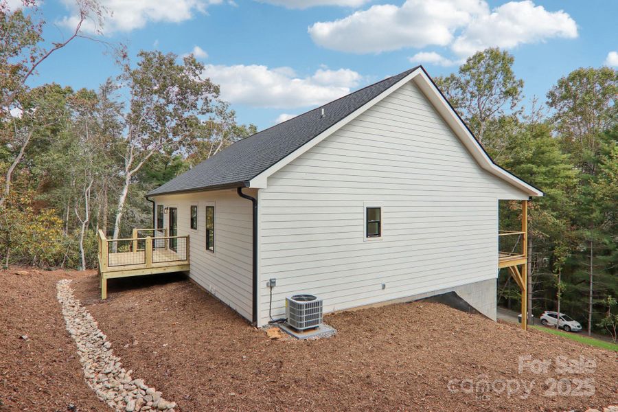 Exterior details and patio area of a home in , Mills River (Image 26). Exterior details and patio area of a home in , Mills River (Image 26).