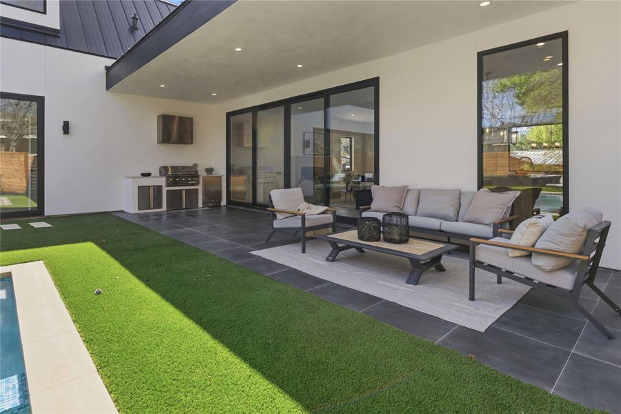 View of patio / terrace with an outdoor kitchen and area to lounge