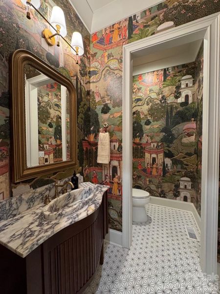Don't miss the stunning powder room!!