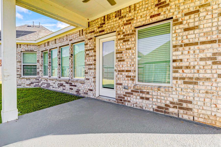 Exterior details and patio area of a home in Marvida, Cypress (Image 18). Exterior details and patio area of a home in Marvida, Cypress (Image 18).