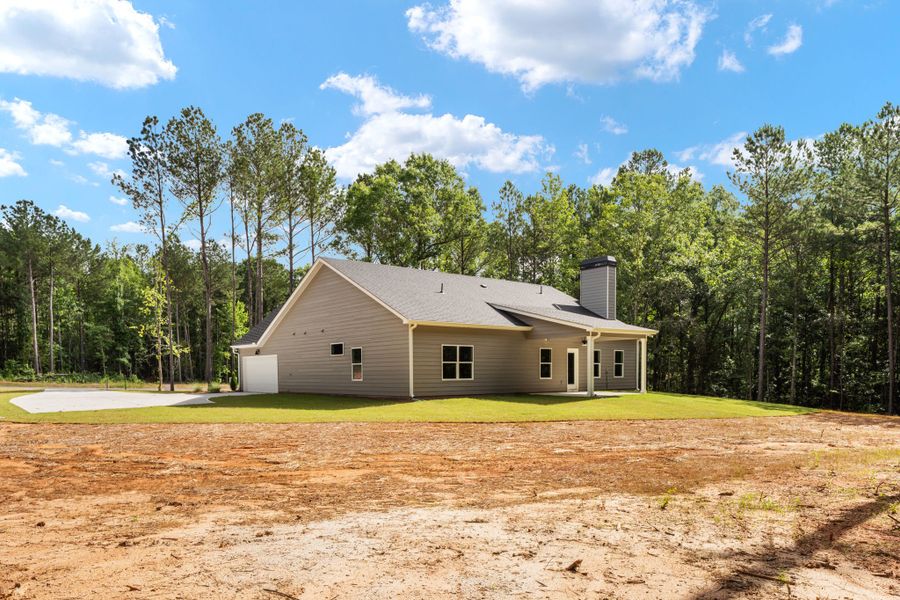 Front exterior of a new home in Flint Farms, Concord, GA, highlighting curb appeal (Image 23).