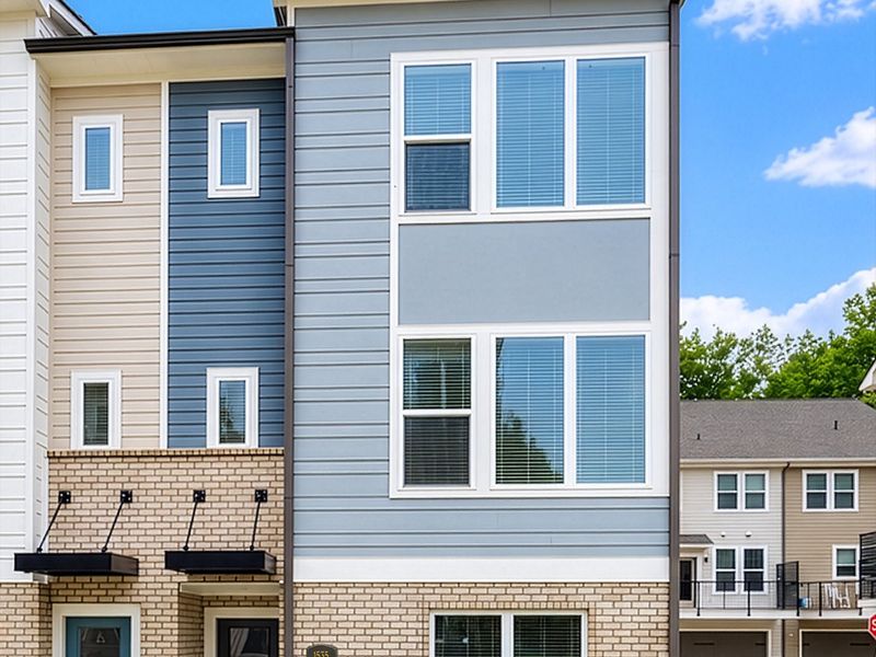 Exterior details and patio area of a home in Central Living at Craig, Charlotte (Image 3).