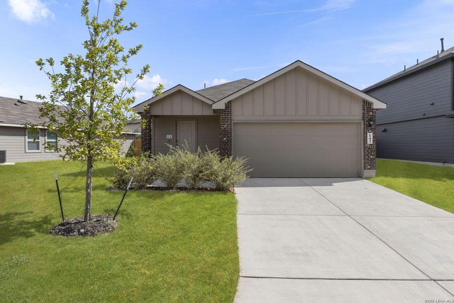 Front exterior of a new home in Redbird Ranch, San Antonio, TX, highlighting curb appeal (Image 20).
