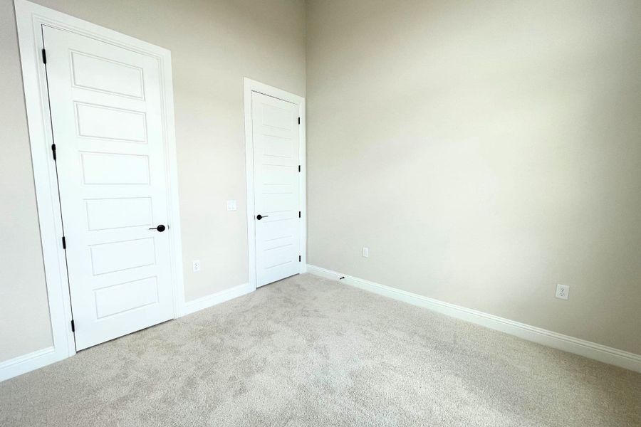 Spacious, unfurnished interior of a new home in Whisper Valley, Manor (Image 31).