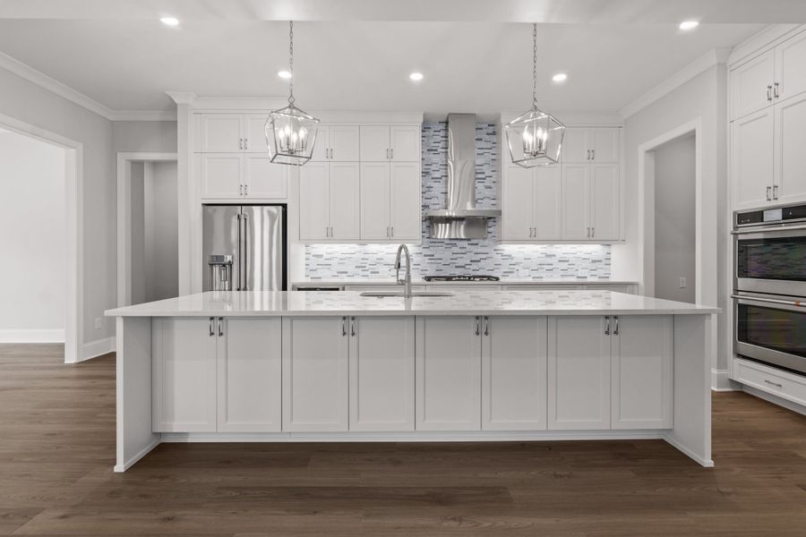 Representative furnished interior of a home built from the The Danville by The Providence Group in Bellwyn, Alpharetta (Image 8).