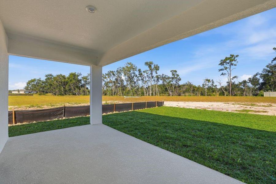 Exterior details and patio area of a home in Palm Wind, Hudson (Image 23).