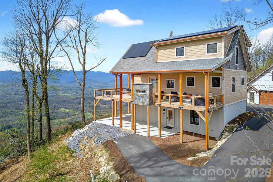 Exterior details and patio area of a home in , Old Fort (Image 33).