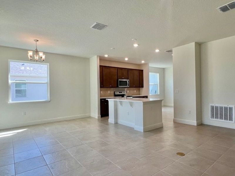 Furnished interior view inside a new home in Lakes At St Sebastian, Micco (Image 6).