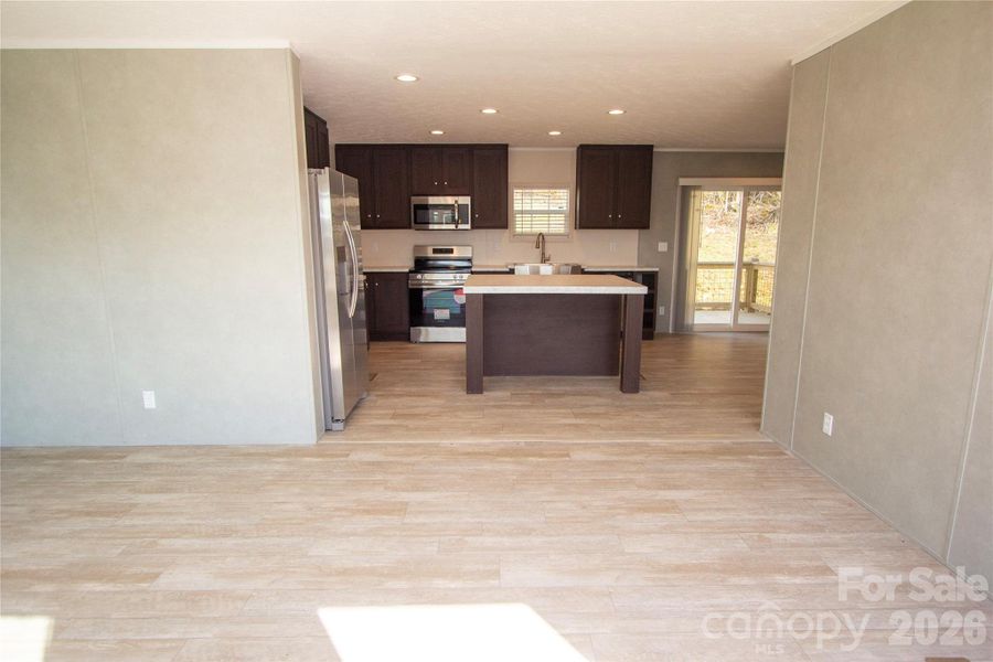 Living Room towards Kitchen & Dining Area