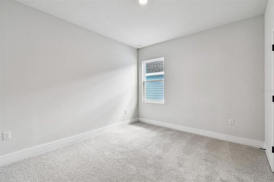 Spacious, unfurnished interior of a new home in Persimmon Park - Garden Series, Wesley Chapel (Image 37).