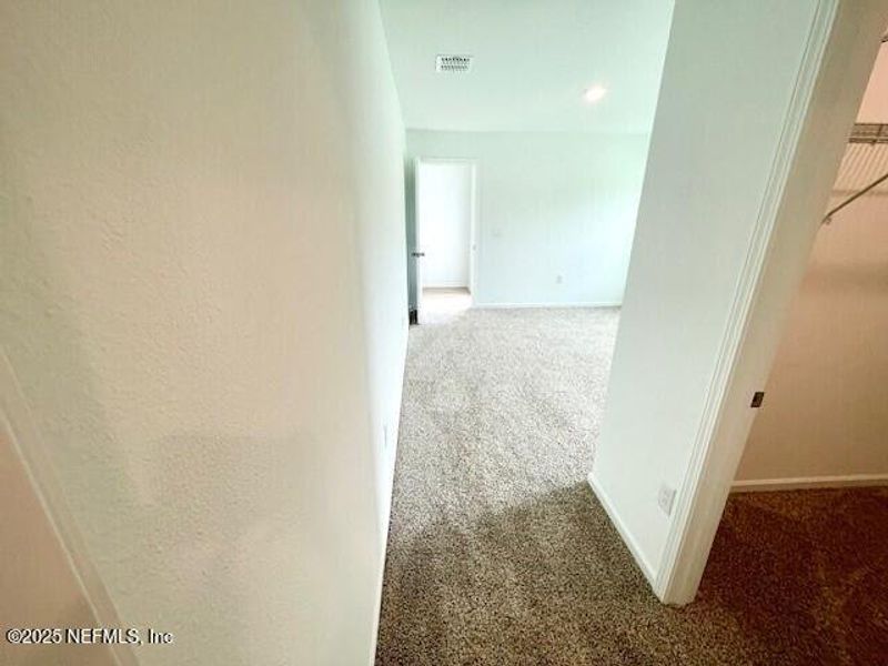 Spacious, unfurnished interior of a new home in Grand Reserve, Bunnell (Image 49).