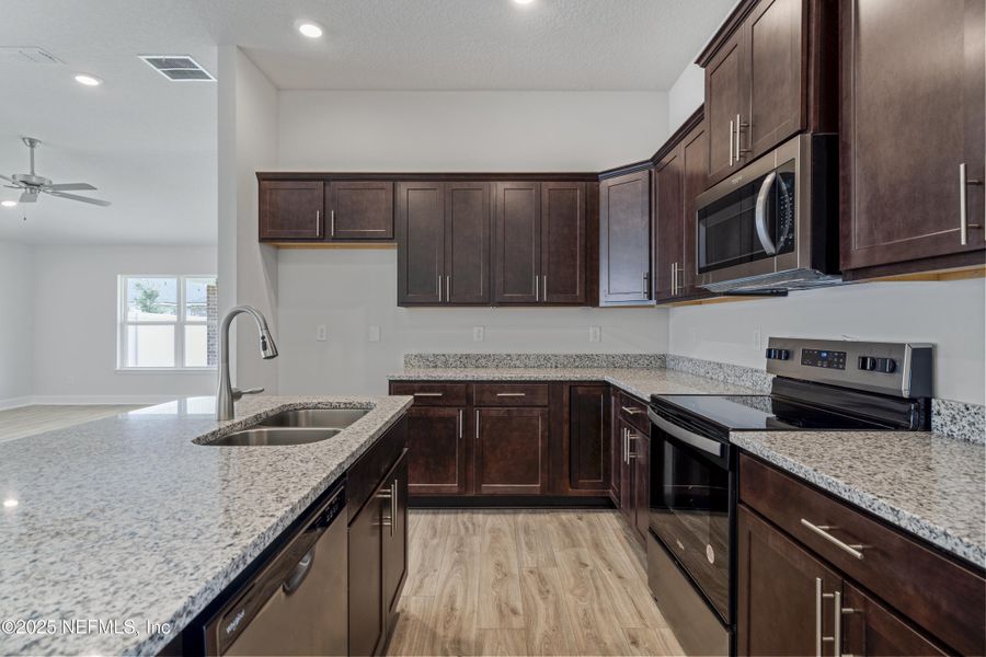 Furnished interior view inside a new home in Shadow Crest at Rolling Hills, Green Cove Springs (Image 4). Furnished interior view inside a new home in Shadow Crest at Rolling Hills, Green Cove Springs (Image 4).