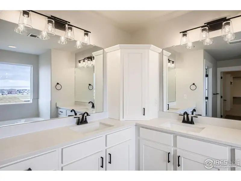 Furnished interior view inside a new home in RainDance, Windsor (Image 8).