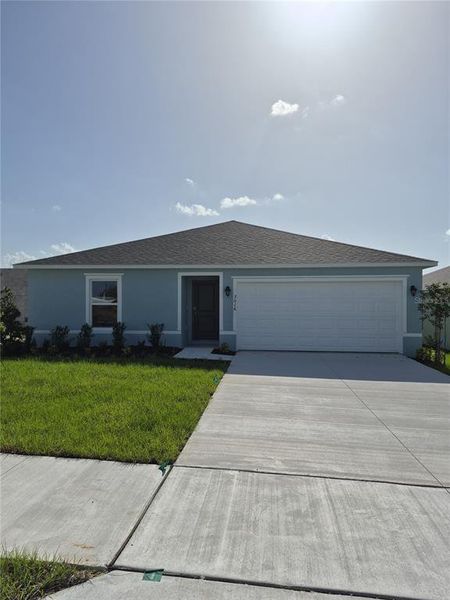 Front exterior of a new home in , Lake Wales, FL, highlighting curb appeal (Image 1). Front exterior of a new home in , Lake Wales, FL, highlighting curb appeal (Image 1).