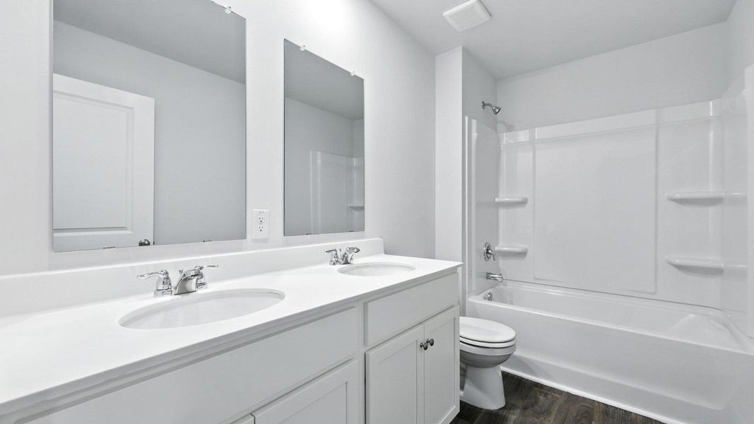 Furnished interior view inside a new home in The Ranch, Holly Hill (Image 9).