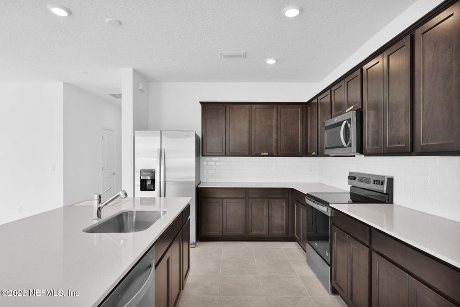 Furnished interior view inside a new home in Hyland Trail, Green Cove Springs (Image 8). Furnished interior view inside a new home in Hyland Trail, Green Cove Springs (Image 8).