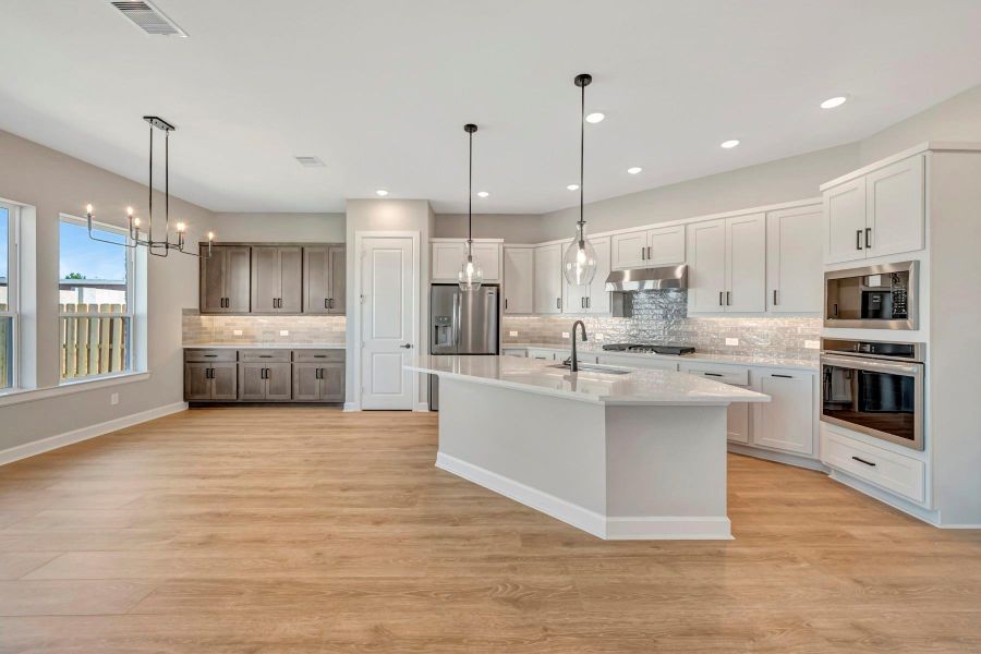 Furnished interior view inside a new home in COLTON - Reserve Collection, Todd Mission (Image 13).