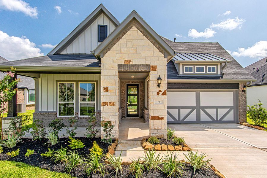 Inviting front entrance featuring attractive architectural details and covered porch Inviting front entrance featuring attractive architectural details and covered porch