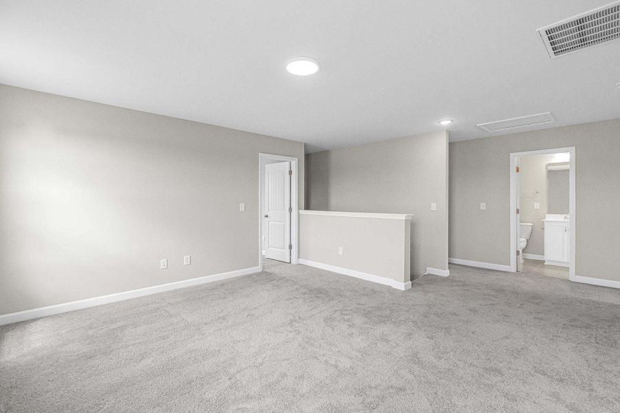 Representative unfurnished interior of a home built from the Magnolia by Caviness & Cates Communities in Bartlett Manor, Youngsville (Image 201).