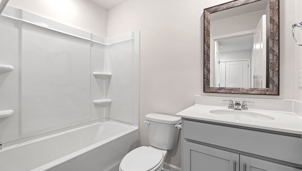 Furnished interior view inside a new home in Tanglewood Townes, Greenville (Image 10).