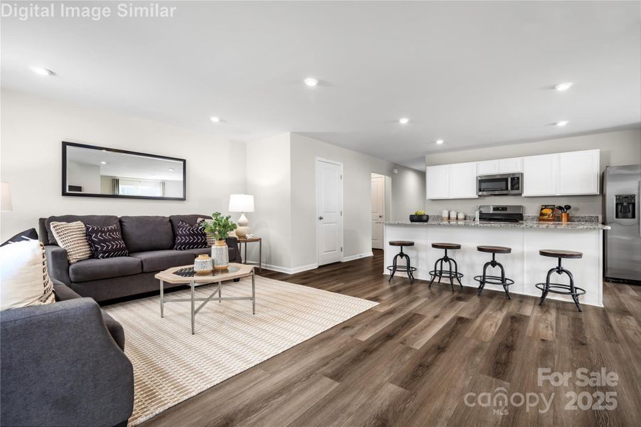 The Large Great Room seamlessly connects to the Dining Area and Kitchen. The Large Great Room seamlessly connects to the Dining Area and Kitchen.