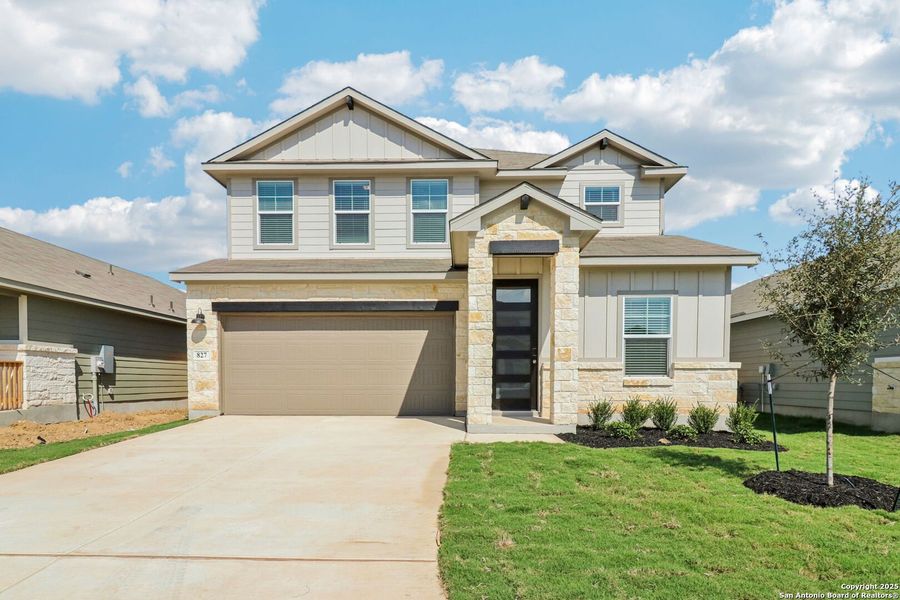 Front exterior of a new home in Estancia Ranch - Premier Series, San Antonio, TX, highlighting curb appeal (Image 2). Front exterior of a new home in Estancia Ranch - Premier Series, San Antonio, TX, highlighting curb appeal (Image 2).