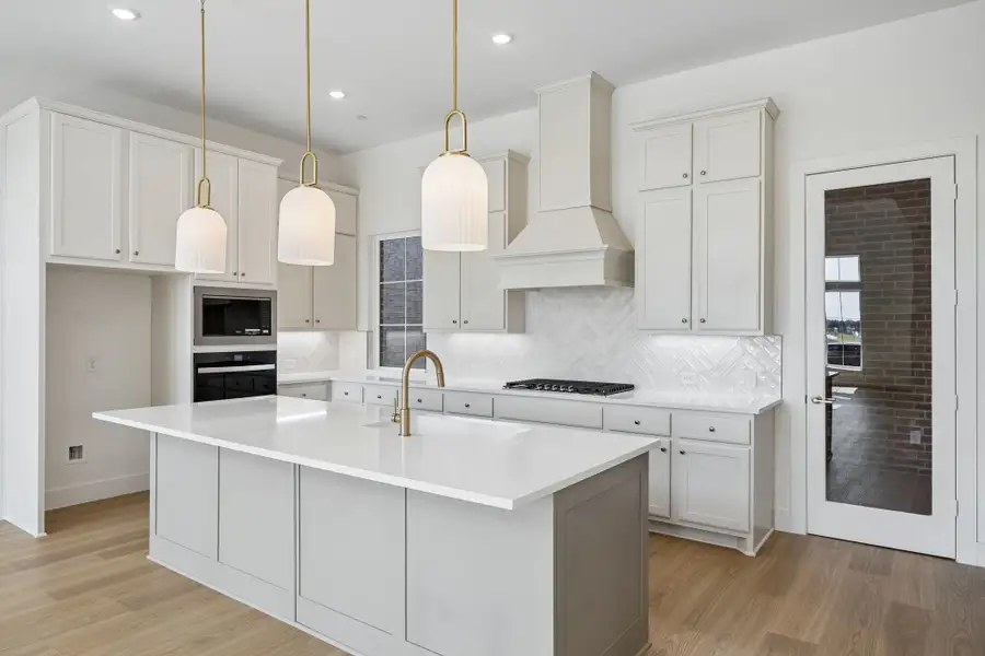 Furnished interior view inside a new home in Newman Village Townhomes, Frisco (Image 6).