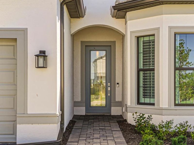 Exterior details and patio area of a home in Talon Preserve on Palmer Ranch, Nokomis (Image 32).