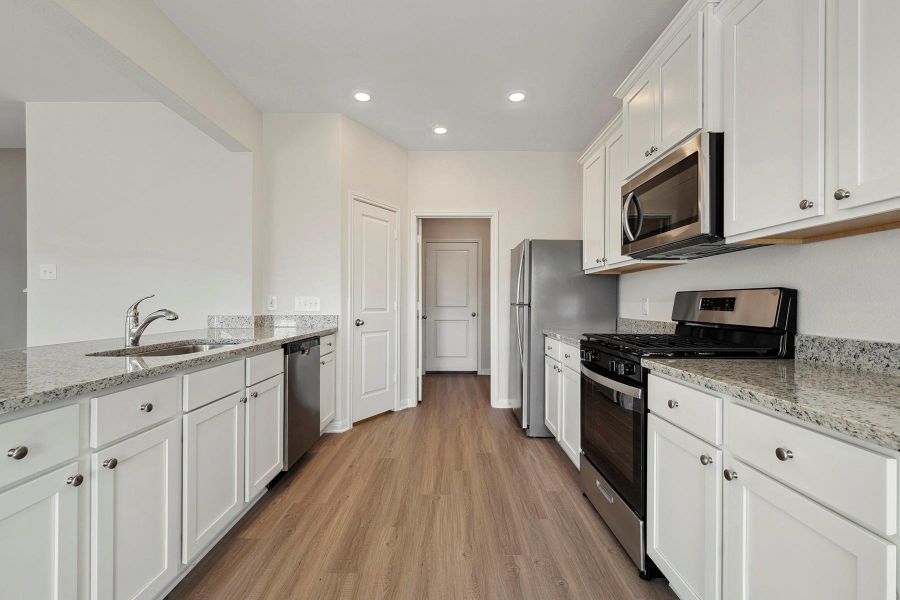 Furnished interior view inside a new home in Trails at Cochran Ranch, Waller (Image 6).