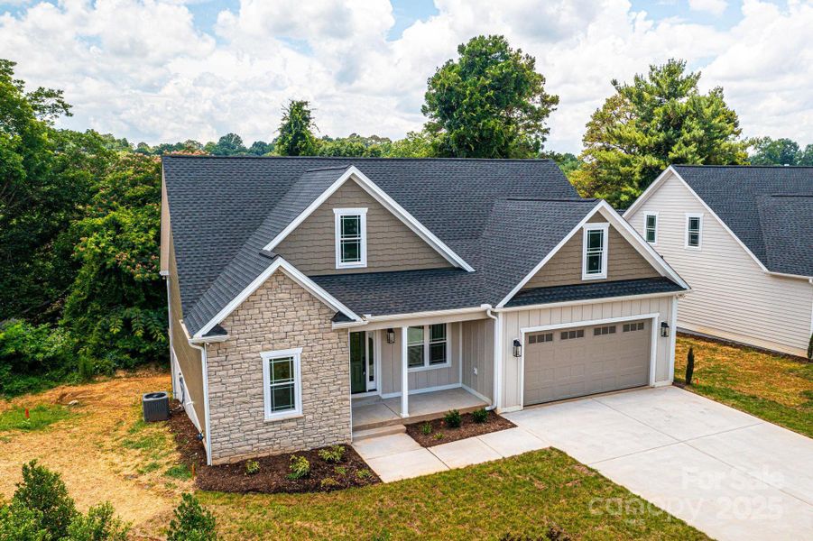 Front exterior of a new home in , Hickory, NC, highlighting curb appeal (Image 2). Front exterior of a new home in , Hickory, NC, highlighting curb appeal (Image 2).