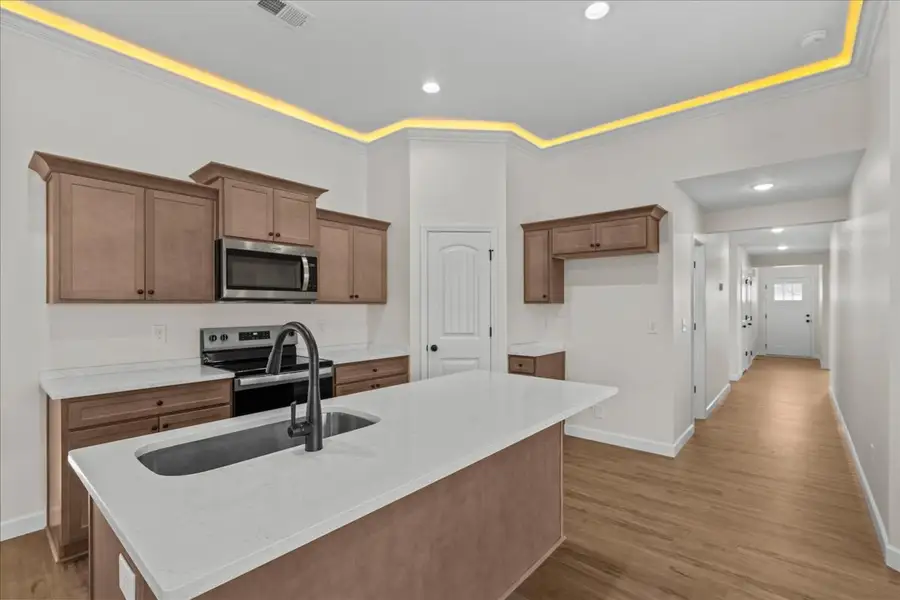 Representative furnished interior of a home built from the Cheshire by Enchanted Homes in Mills Gin, Campobello (Image 4).