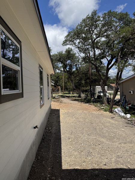Exterior details and patio area of a home in , Spring Branch (Image 3).