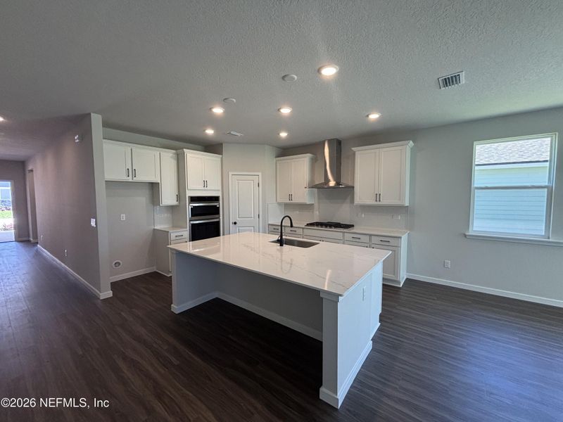 Furnished interior view inside a new home in Reserve East, Flagler Beach (Image 13).