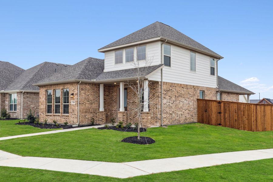 Representative exterior photo of a completed home built from the Starling by Centre Living Homes in Dove Hollow, Waxahachie, TX (Image 25).