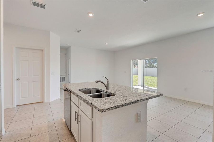 Furnished interior view inside a new home in Sunset Lakes Estates, Mascotte (Image 11).
