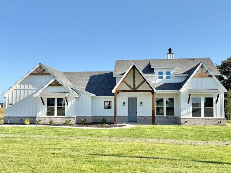 Front exterior of a new home in , Weatherford, TX, highlighting curb appeal (Image 11).