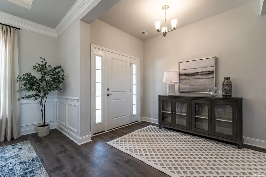 Representative furnished interior of a home built from the 1826 by Adams Homes in Copper Creek, Winterville (Image 4).