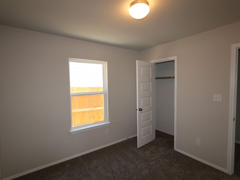 Spacious, unfurnished interior of a new home in Heritage, Dripping Springs (Image 8).