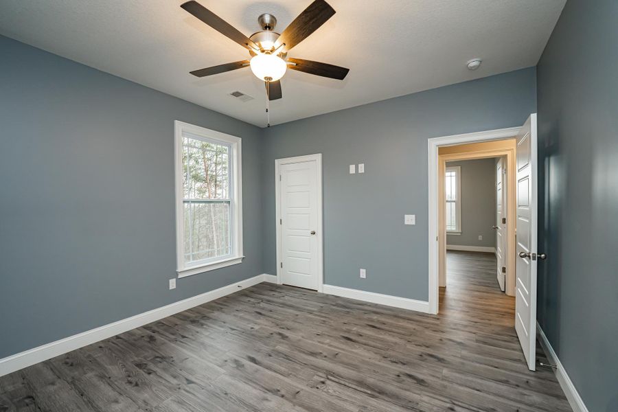 Representative unfurnished interior of a home built from the Roosevelt Elite by Enchanted Homes in Pointe Summit, Slater-Marietta (Image 21).