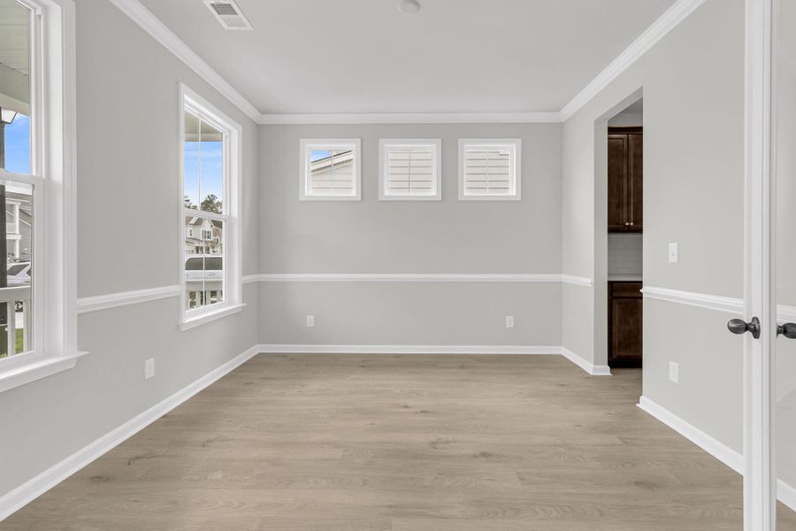 Spacious, unfurnished interior of a new home in Tidewater at Lakes of Cane Bay, Summerville (Image 19). Spacious, unfurnished interior of a new home in Tidewater at Lakes of Cane Bay, Summerville (Image 19).