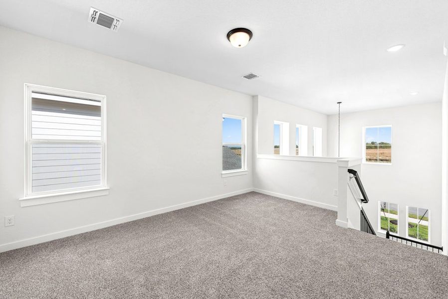 Spacious, unfurnished interior of a new home in University Heights, Round Rock (Image 32).