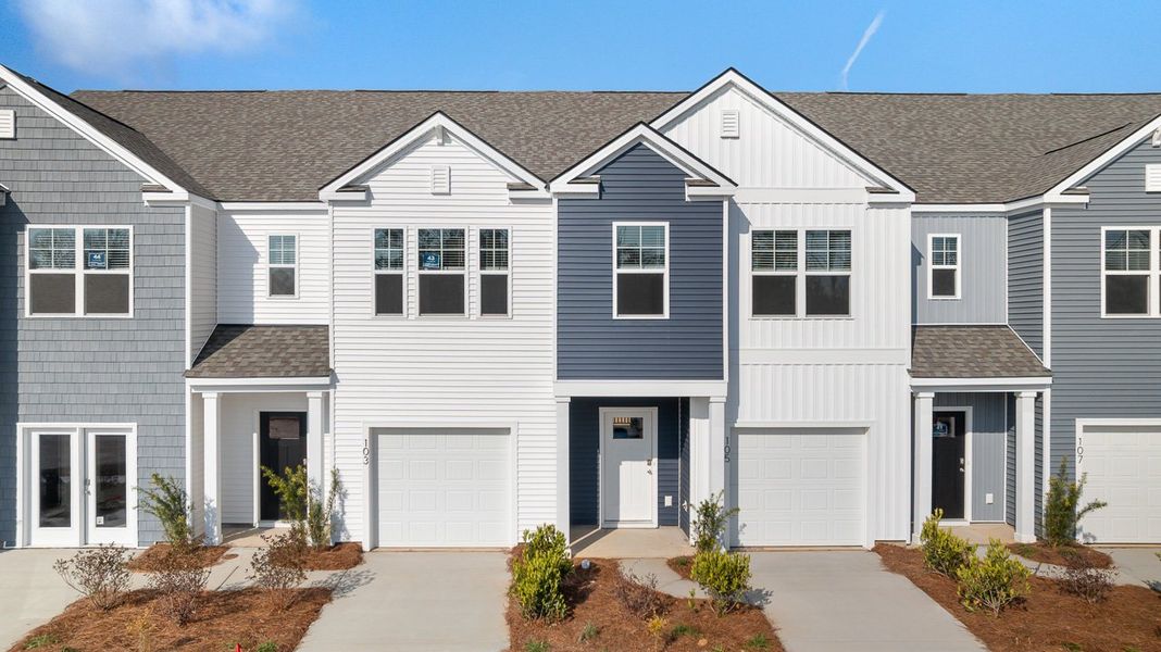 Front exterior of a new home in Marion Village, Santee, SC, highlighting curb appeal (Image 1). Front exterior of a new home in Marion Village, Santee, SC, highlighting curb appeal (Image 1).