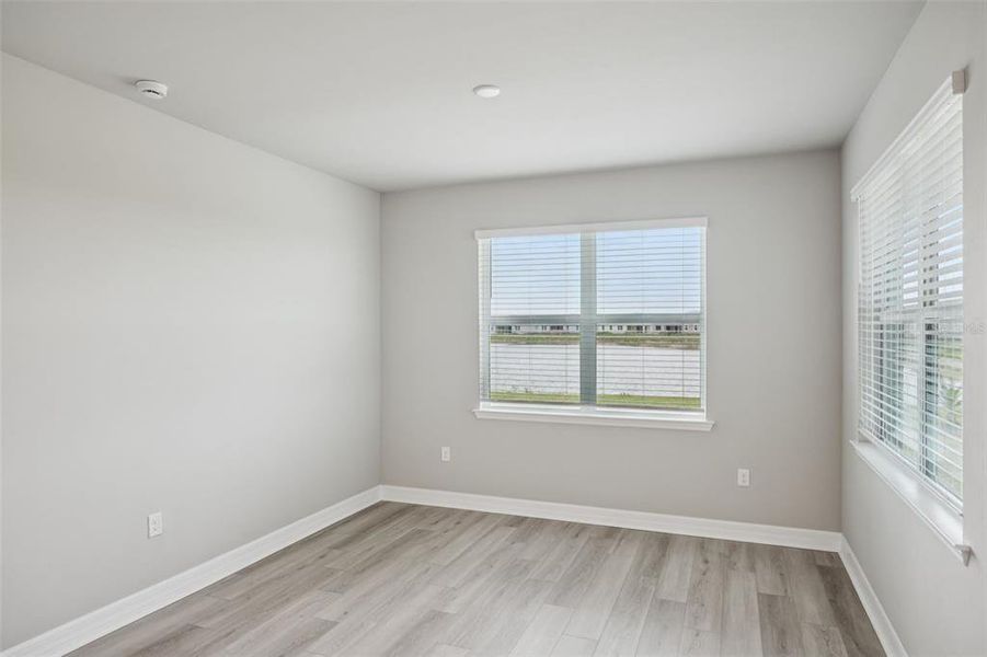 Spacious, unfurnished interior of a new home in Crescent Lakes - Signature Series, Punta Gorda (Image 23).