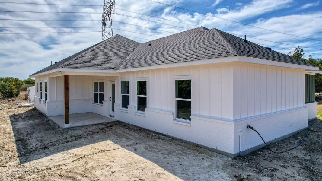Representative exterior photo of a completed home built from the Lucas by Zeal Home Builders in Echo Grove, Poolville, TX (Image 43).