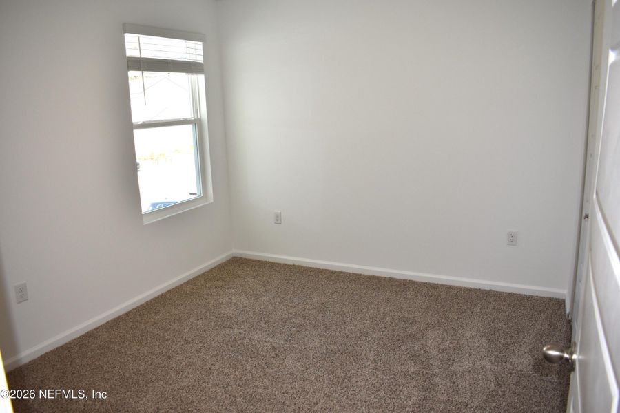 Spacious, unfurnished interior of a new home in Irongate Villas, Jacksonville (Image 24).