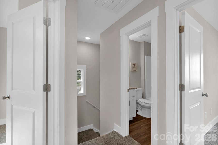 Upstairs, you'll find three bedrooms and two full baths.