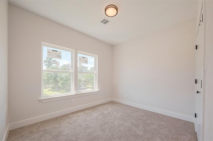 Second bedroom is where comfort and coziness awaits. Featuring wide windows to allow natural sunlight.